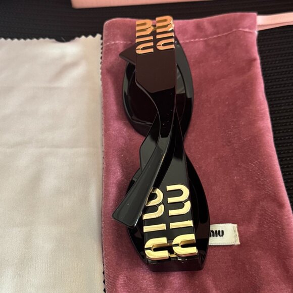 Miu Miu Black & Gold Statement Sunglasses